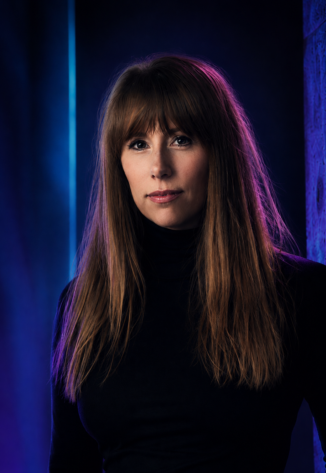 Melanie Dunn — close-up with blue and pink light